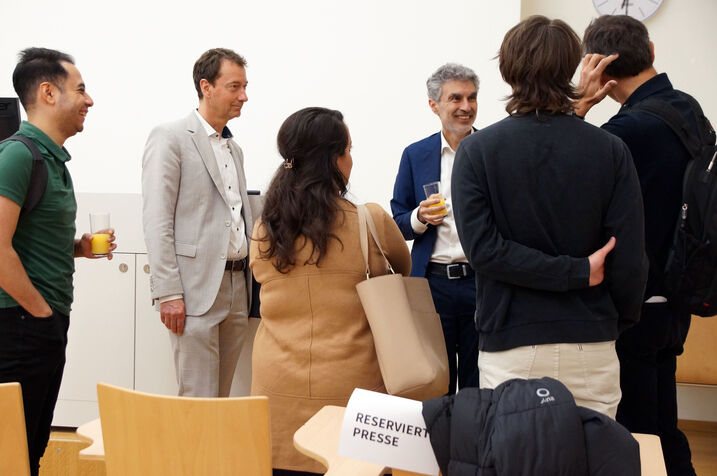 Yoshua Bengio with attendees.